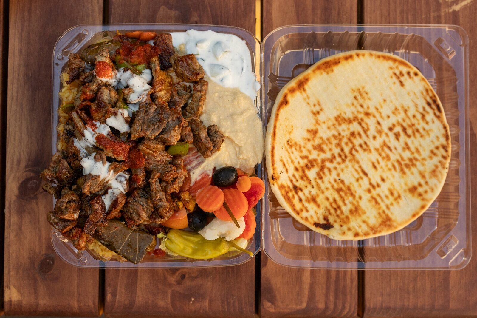 Beef over rice with pita
