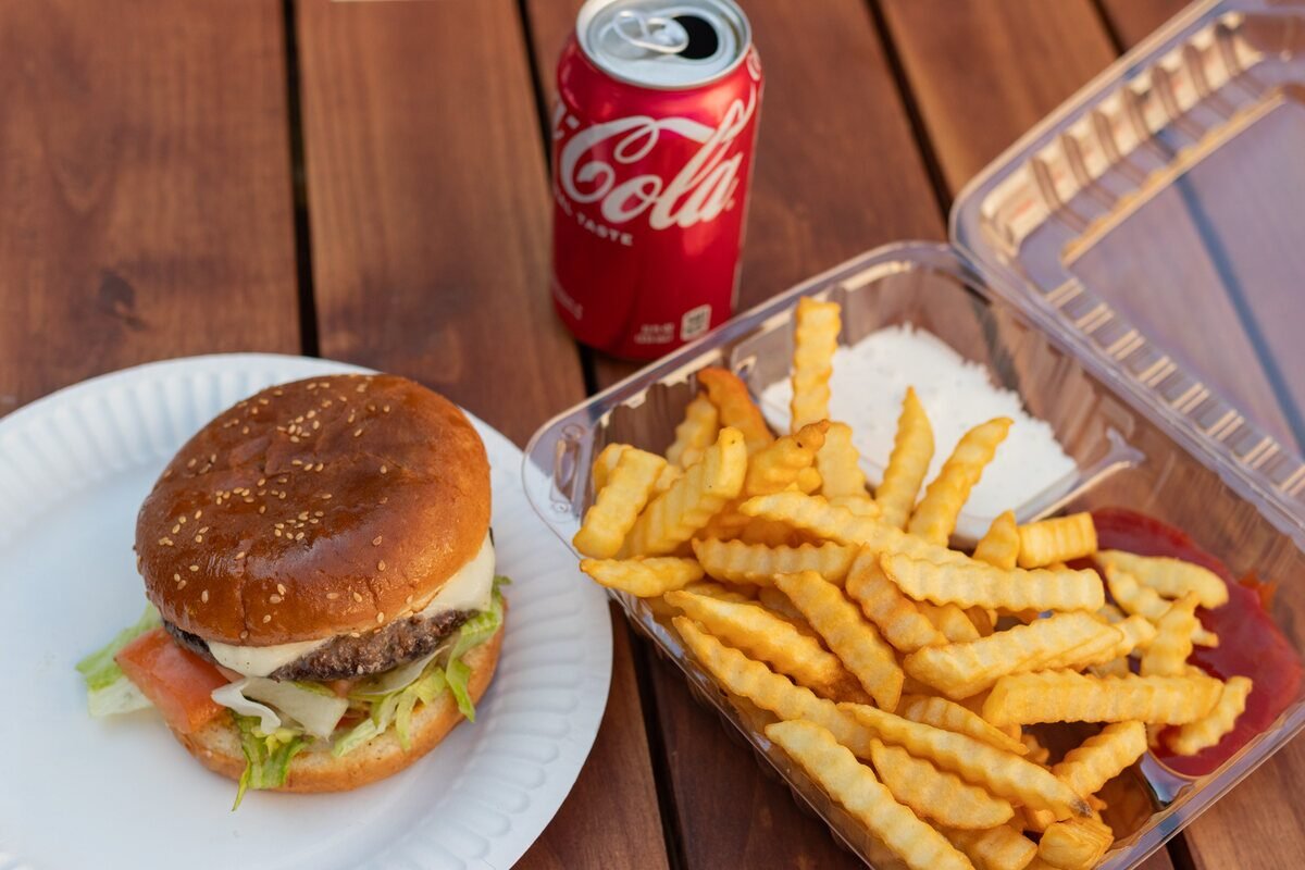 Cheeseburger meal with fries and a drink