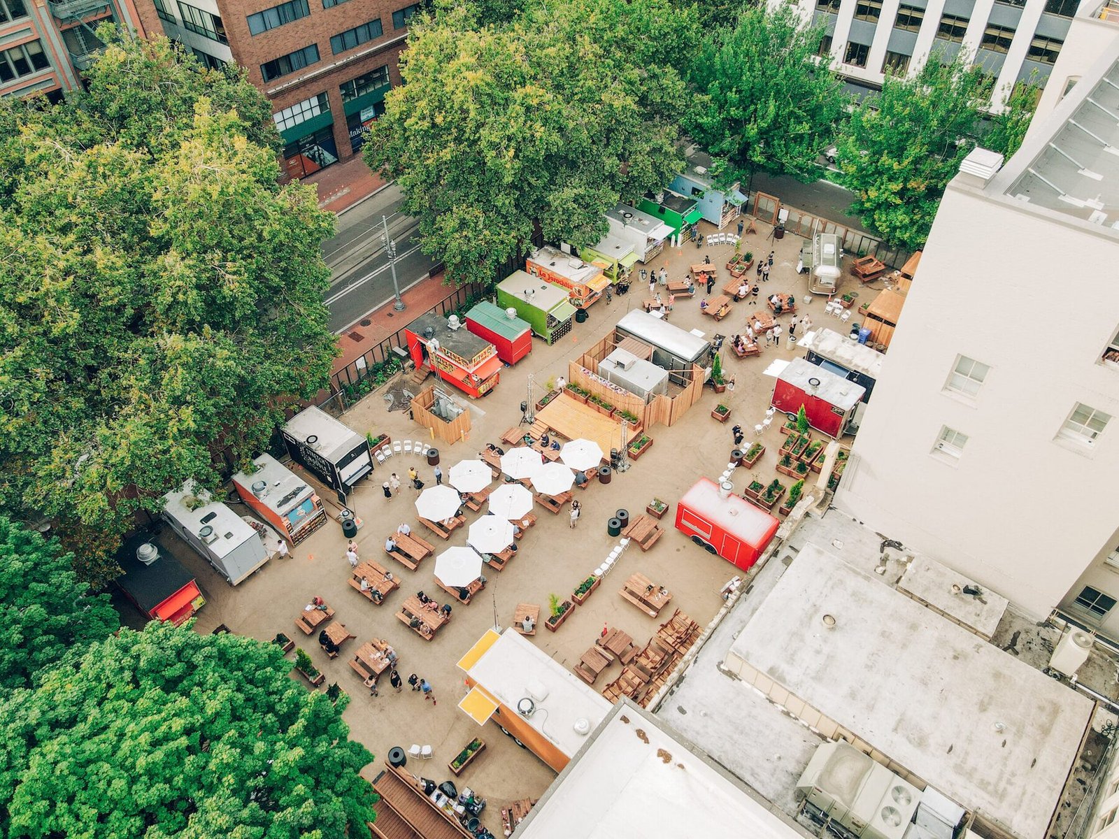 An aerial view of the carts, tables and trees at Midtown Beer Garden
